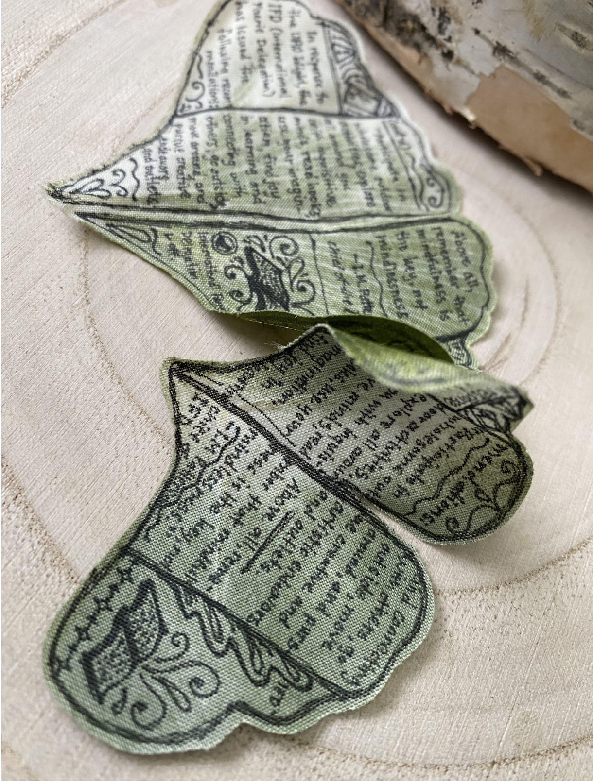 Fabric leaflet with the IFD's URO Blight recommendations, stitched with hand-lettered text and illustrations